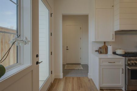 Doorway to outside featuring light hardwood / wood-style floors