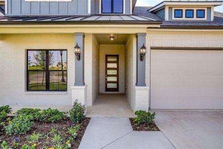 Entrance to property with a garage