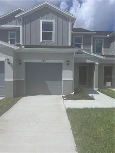 New construction Townhouse house 788 Stoney Point Circle, Davenport, FL 33896 - photo 0