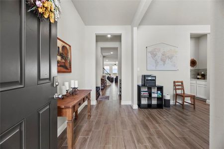 Welcome to a world of upgrades! Step inside to discover the charm of easy-care wood-like tile flooring throughout the first floor. Experience luxury living at its finest.