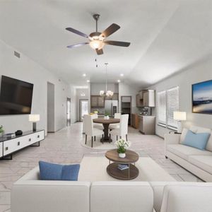 The home features loft ceilings, elegant lighting fixtures and recessed lighting complimenting the large windows allowing for an abundance of light. **This image is from another Saratoga Home with similar floor plan - Myrtle Floorplan.**