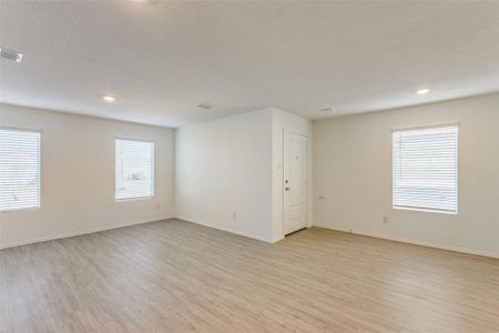 Spare room featuring light hardwood / wood-style flooring