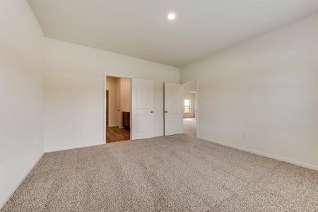 Unfurnished bedroom with carpet