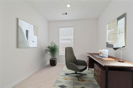 This den is the perfect spot for a home office! Featuring tile flooring, high ceilings, and a large window with privacy blinds.