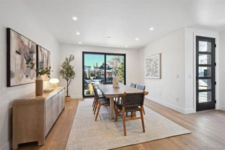 Elegant dining room with sliding glass doors for entertaining or quiet meals at home