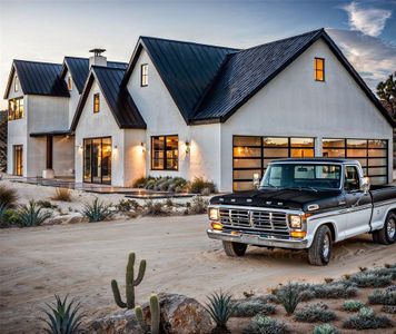 Modern farmhouse style home with a standing seam roof, stucco siding, a chimney, a garage, and metal roof