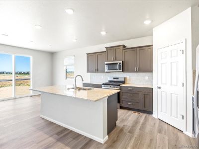 New construction Single-Family house 6014 Hourglass Dr, Brighton, CO 80603 Snowberry- photo 5 5