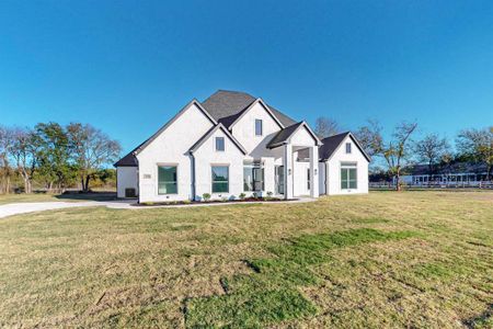 View of front of property with a front lawn