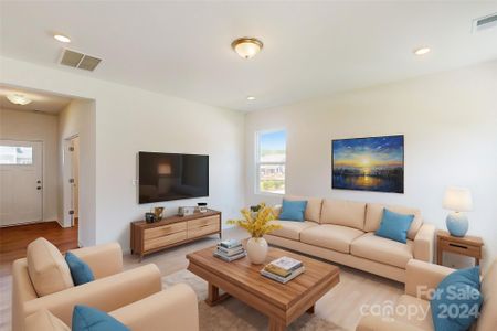 Family room shown with virtual staging