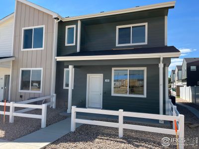 New construction Townhouse house 3720 Sequoia Ct, Evans, CO 80620 - photo 0