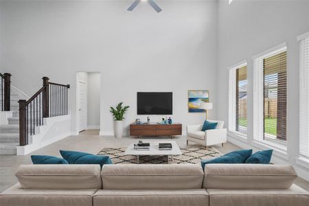 Gather the family and guests together in your lovely living room! Featuring high ceilings, recessed lighting, ceiling fan, custom paint, gorgeous floors, and large windows that provide plenty of natural lighting throughout the day.