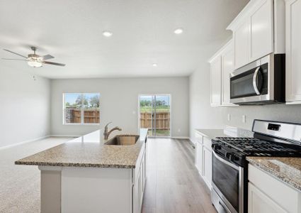 The kitchen in the Pike sits right off the dining room and family room.