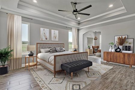 Bedroom with ceiling fan, crown molding, a tray ceiling, and light hardwood / wood-style flooring