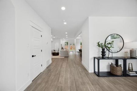 Entry way with wood-style floors