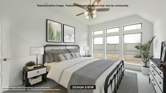 Bedroom featuring ceiling fan, multiple windows, lofted ceiling, and carpet floors