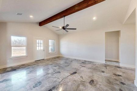 Unfurnished room featuring recessed lighting, visible vents, lofted ceiling with beams, a ceiling fan, and baseboards