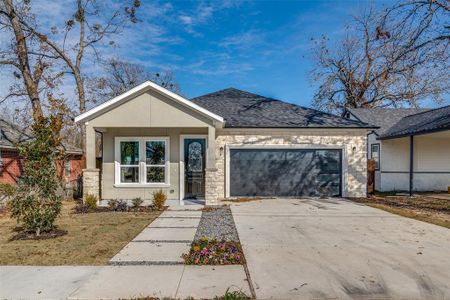 View of front of home with a garage