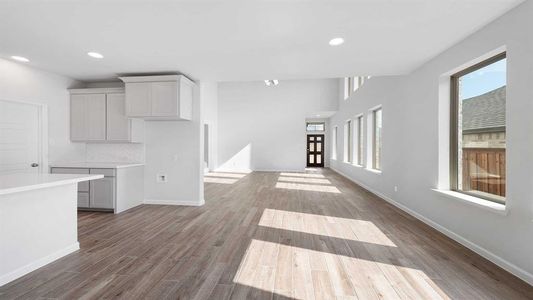 Unfurnished living room with wood-type flooring