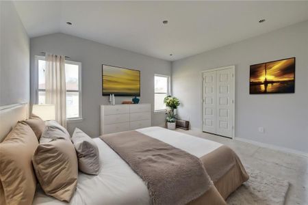 Cozy and inviting, this secondary bedroom provides a peaceful space for rest and relaxation. The soft carpeting and abundant natural light make it a perfect room for family members or guests, offering comfort and style in equal measure. **This image is from another Saratoga Home - Athena floorplan.**