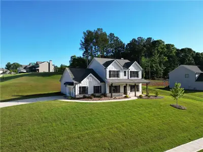 New construction Single-Family house 1025 Red Oak Blvd, Loganville, GA 30052 plan (GA)Jackson A 2 Front Entry - image