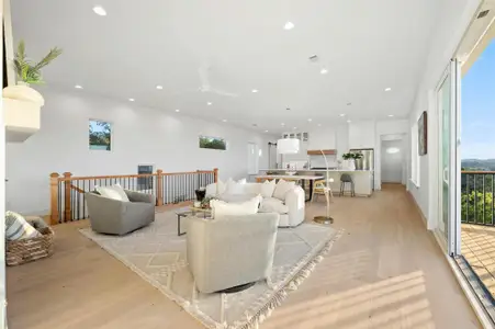 The luminous open great room floor plan makes it easy to stay connected with friends and family throughout the main living area.