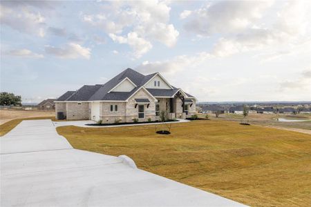 Craftsman-style house with a front lawn