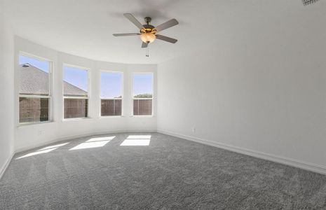 Elegant owner's suite with Bay window *real home pictured