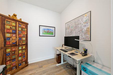 Bright and inviting study located off the entry, perfect for work or study