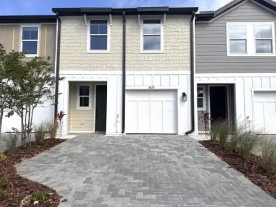 New construction Townhouse house 7679 Deer Valley Cir, Tampa, FL 33635 Surf- photo 0