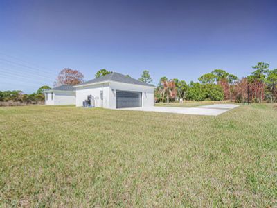 New construction Single-Family house 10631 Lighter Wood Ln, Fort Pierce, FL 34945 - image