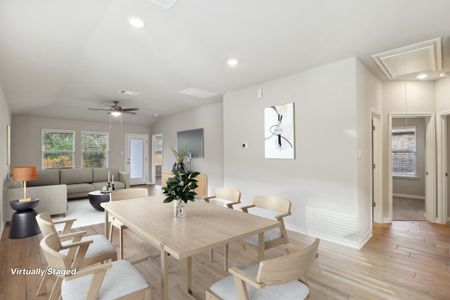 Virtually staged dining room in the Cascade floorplan at a Meritage Homes community.