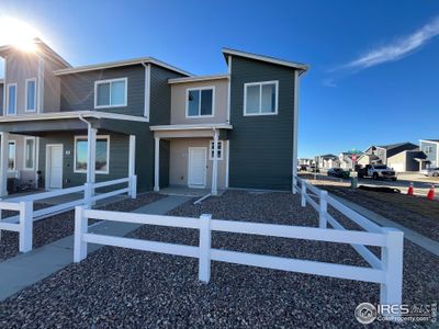 New construction Townhouse house 3900 Congaree Wy, Evans, CO 80620 - photo 0