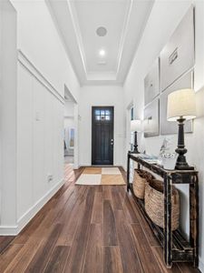 Inviting foyer with ceiling treatment (*Photo not of actual home and used for illustration purposes only.)