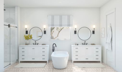 Gorgeous primary bath with dual vanities and freestanding tub