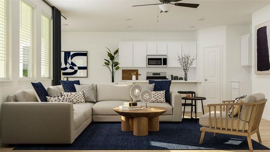 Living room featuring ceiling fan and hardwood / wood-style flooring