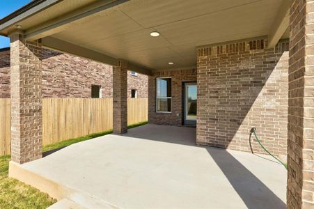 Charming patio area, perfect for morning coffee or evening relaxation.