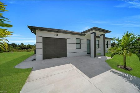 New construction Single-Family house 711 Roma Ave S, Lehigh Acres, FL 33974 - image