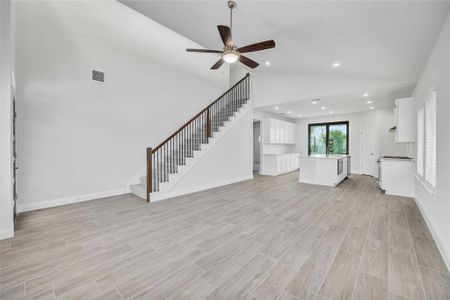 Large family room leads to the kitchen and dining room