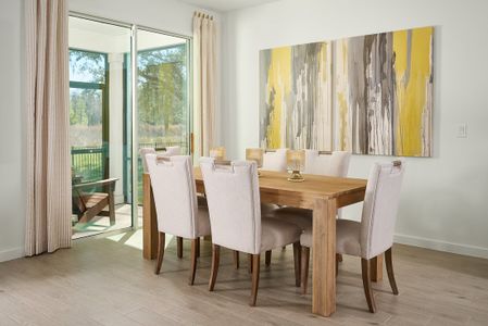 Dining of the Orchid floorplan modeled at Lakes at Bella Lago.