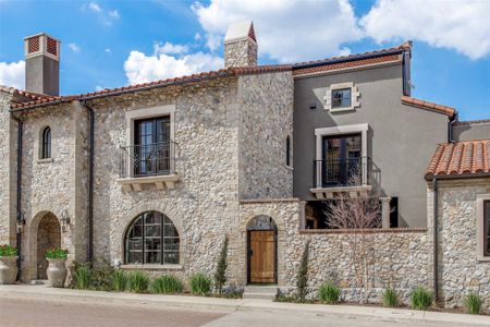 Mediterranean / spanish home with a balcony