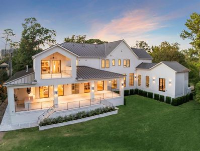 This stunning aerial view captures a luxury new construction home in prestigious River Oaks, situated on an expansive 20,190-square-foot lot, as per Survey. The vast grounds offer endless possibilities, with ample space for a pool, sports court, or immaculate gardens. A truly exceptional property, combining grand design with outdoor potential in one of Houston's most coveted neighborhoods.