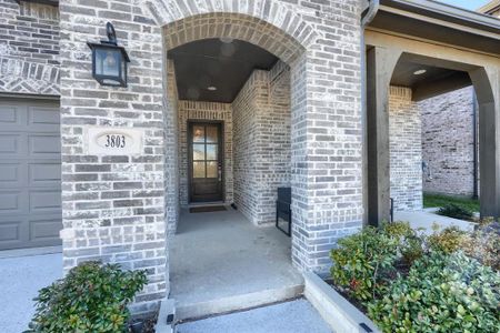 Property entrance featuring a garage