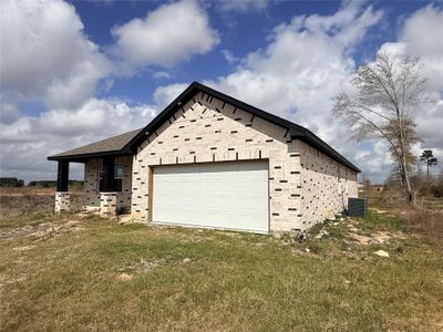 New construction Single-Family house 523 Rd 5844, Cleveland, TX 77327 - image