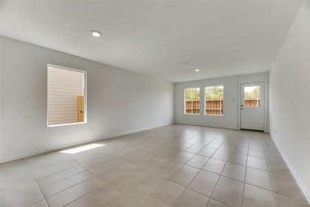 Spare room featuring light tile patterned flooring