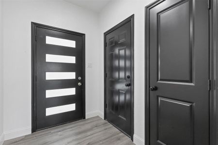 Foyer with light wood-type flooring