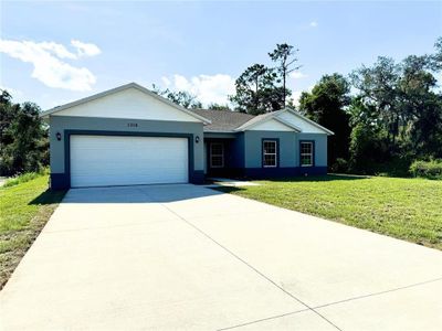 New construction Single-Family house 1202 Alafia Way, Poinciana, FL 34759 - photo 0