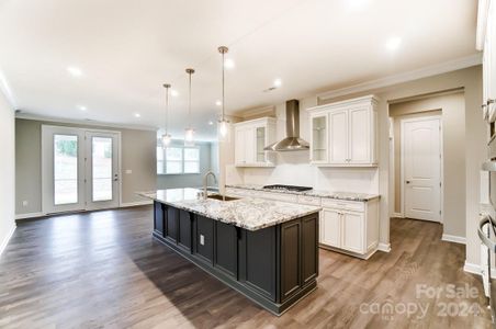 View of Kitchen with Island-Picture Similar to Subject Property