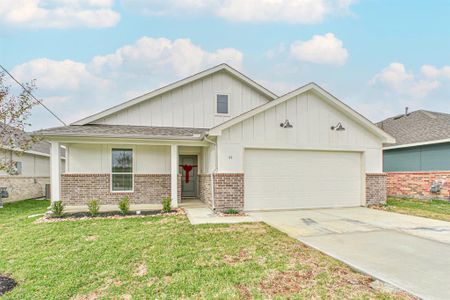 New construction Single-Family house 135 County Road 51030, Cleveland, TX 77327 - photo 0