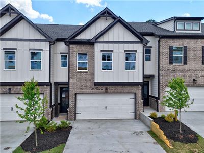 New construction Townhouse house 5706 Urban Village Wy, Unit 4, Tucker, GA 30084 Sweetwater- photo 0