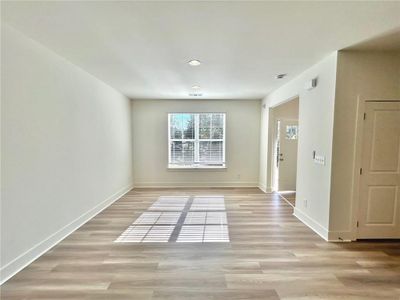 Empty room featuring light hardwood / wood-style flooring